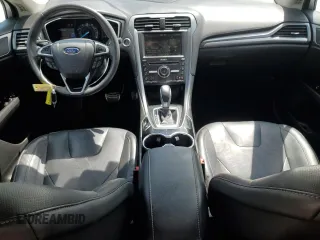 2016 Ford Fusion Titanium с VIN 3FA6P0K9XGR218027, выставлен на аукционе Copart как лот 54249925 с пробегом 111 682 миль миль и Списание • Salvage title. История ставок и продаж доступна на DreamBid. Изображение 8.