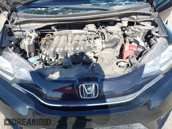 2015 Honda Fit EX-L z VIN 3HGGK5H81FM705199, wystawiony jako IAAI lot #42310099 z przebiegiem Nie podano mil oraz . Historia ofert i sprzedaży dostępna na DreamBid. Obrazek 10.