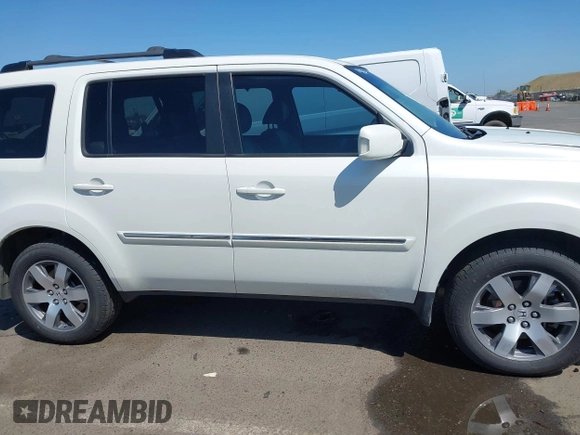 2013 Honda Pilot Touring with VIN 5FNYF4H92DB031589, listed as a IAAI auction lot 42159313 with 192,604 mi miles and . Bid and sale history available at carsss.com. Image 13.