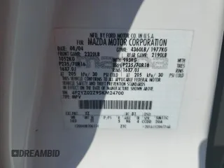 2005 Mazda Tribute i with VIN 4F2YZ02Z95KM24700, listed as a Copart auction lot 42002775 with 128,891 mi miles and Salvage Title. Bid and sale history available at carsss.com. Image 12.