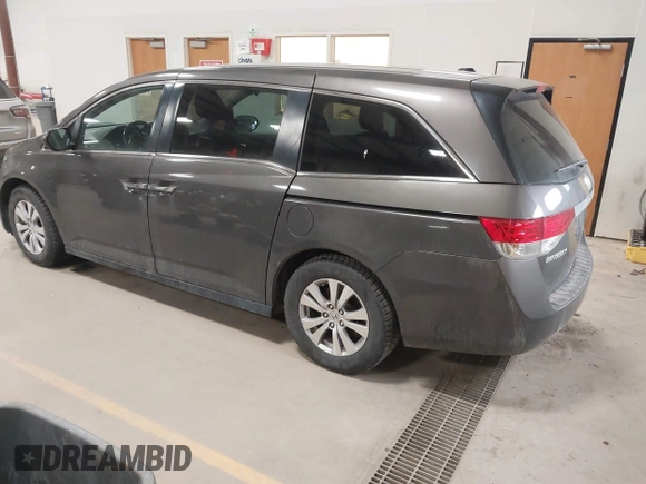 2015 Honda Odyssey EX-L with VIN 5FNRL5H64FB055890, listed as a IAAI auction lot 41706141 with 155,167 mi miles and . Bid and sale history available at carsss.com. Image 3.