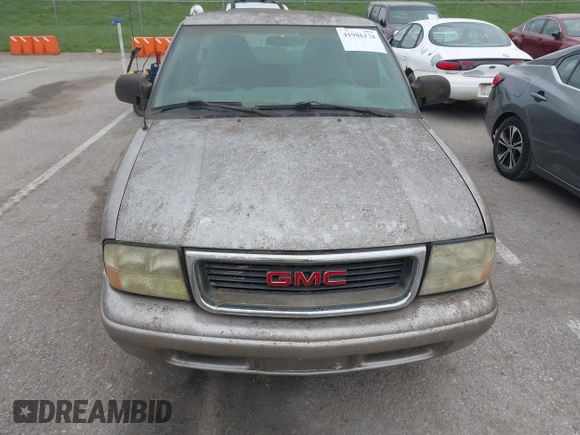 2003 GMC Sonoma SLS z VIN 1GTCS19X838182906, wystawiony jako IAAI lot #41986178 z przebiegiem Nie podano mil oraz . Historia ofert i sprzedaży dostępna na DreamBid. Obrazek 6.