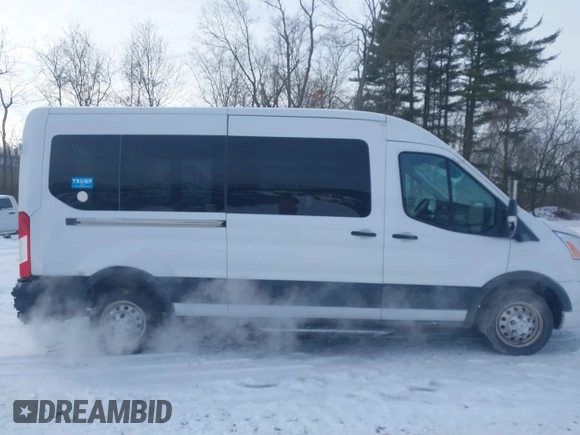 2022 Ford Transit Passenger XL with VIN 1FBAX9C87NKA80161, listed as a IAAI auction lot 41389325 with 128,868 mi miles and . Bid and sale history available at DreamBid. Image 14.