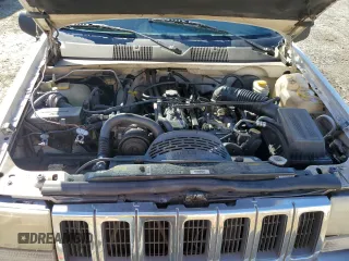 1996 Jeep Grand Cherokee Laredo with VIN 1J4FX58SXTC349575, listed as a Copart auction lot 80545584 with 302,636 mi miles and Salvage Title. Bid and sale history available at carsss.com. Image 12.