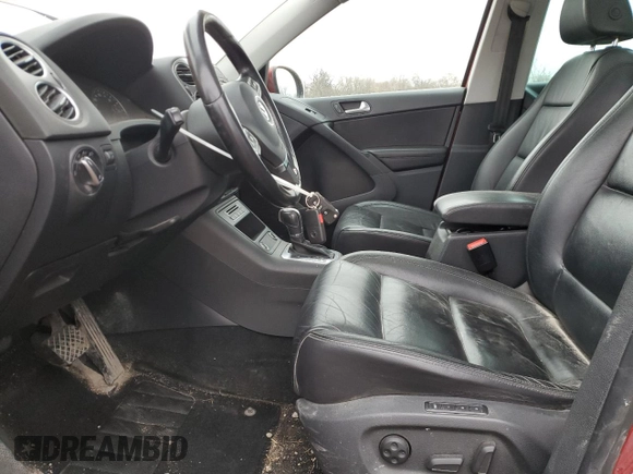 2011 Volkswagen Tiguan SE with VIN WVGBV7AXXBW001845, listed as a Copart auction lot 52414935 with 256,311 mi miles and Salvage Title. Bid and sale history available at DreamBid. Image 7.