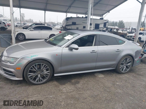 2016 Audi A7 3.0 Premium Plus with VIN WAUWGAFC0GN003357, listed as a IAAI auction lot 41468854 with 62,590 mi miles. Bid and sale history available at carsss.com. Image 14.