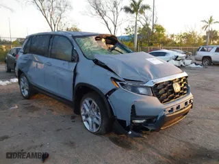2024 Honda Passport EX-L with VIN 5FNYF8H5XRB017807, listed as a IAAI auction lot 41530820 with 5,797 mi miles. Bid and sale history available at carsss.com. Image 1.