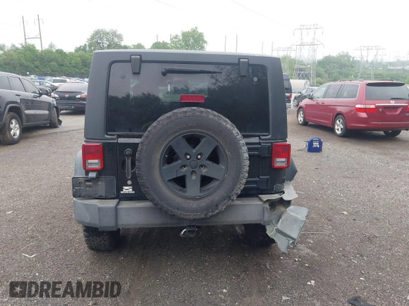 2007 Jeep Wrangler Rubicon with VIN 1J4GA64117L149666, listed as a IAAI auction lot 42252464 with 100,791 mi miles and . Bid and sale history available at DreamBid. Image 16.