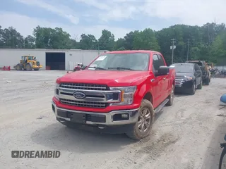 2018 Ford F-150 XL with VIN 1FTFX1E59JFB49943, listed as a IAAI auction lot 42291932 with 164,178 mi miles and . Bid and sale history available at DreamBid. Image 2.