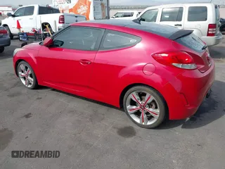 2013 Hyundai Veloster w/Black Int with VIN KMHTC6AD7DU117562, listed as a IAAI auction lot 41993745 with 106,780 mi miles. Bid and sale history available at carsss.com. Image 3.
