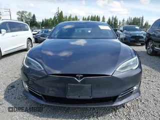 2017 Tesla Model S 100D with VIN 5YJSA1E27HF202563, listed as a IAAI auction lot 42460702 with 71,715 mi miles and . Bid and sale history available at DreamBid. Image 12.