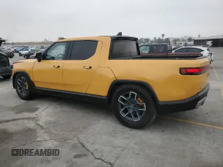 2022 Rivian R1T Launch Edition z VIN 7FCTGAAL2NN011755, wystawiony jako Copart lot #59934185 z przebiegiem 12 261 mil mil oraz Szkoda całkowita • Salvage title. Historia ofert i sprzedaży dostępna na DreamBid. Obrazek 2.