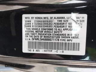 2011 Honda Odyssey EX-L with VIN 5FNRL5H68BB071178, listed as a IAAI auction lot 42286324 with 213,847 mi miles and . Bid and sale history available at DreamBid. Image 9.