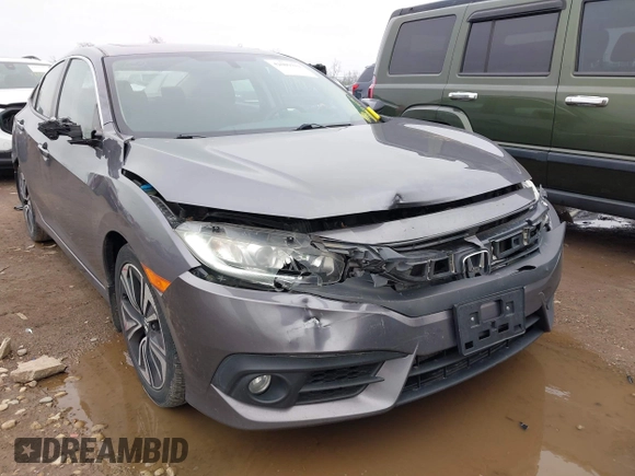 2017 Honda Civic EX-T with VIN 19XFC1F34HE014334, listed as a IAAI auction lot 42009311 with 124,717 mi miles. Bid and sale history available at carsss.com. Image 6.
