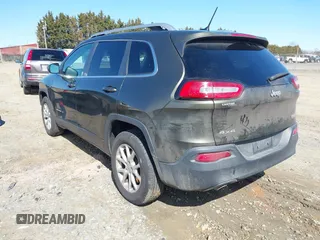 2014 Jeep Cherokee Latitude with VIN 1C4PJMCS5EW201462, listed as a IAAI auction lot 41727379 with 170,958 mi miles and . Bid and sale history available at DreamBid. Image 3.
