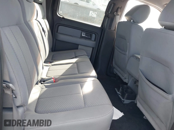 2013 Ford F-150 XL with VIN 1FTFW1ET0DFB39467, listed as a IAAI auction lot 40770557 with 166,779 mi miles and . Bid and sale history available at DreamBid. Image 8.