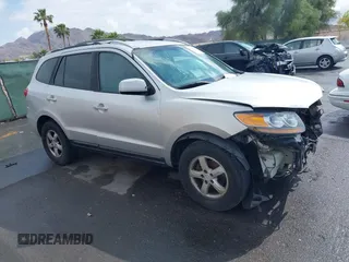 2007 Hyundai Santa Fe GLS z VIN 5NMSG13D87H053810, wystawiony jako IAAI lot #42185382 z przebiegiem 217 095 mil mil oraz . Historia ofert i sprzedaży dostępna na DreamBid. Obrazek 1.