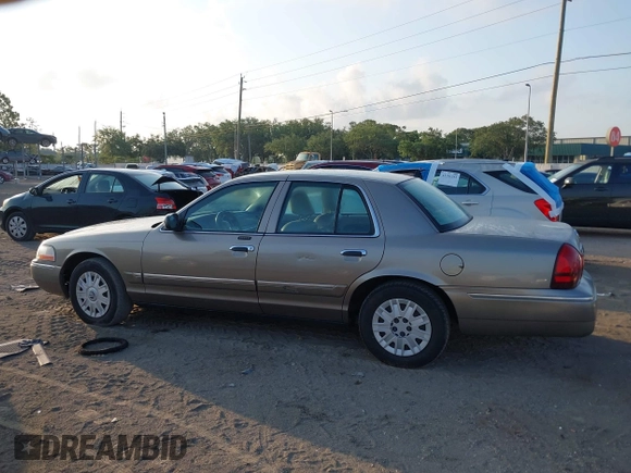 2004 Mercury Grand Marquis GS with VIN 2MEFM74WX4X696703, listed as a IAAI auction lot 42171970 with 149,556 mi miles and . Bid and sale history available at DreamBid. Image 14.
