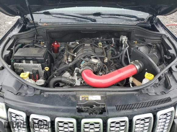 2017 Jeep Grand Cherokee Summit with VIN 1C4RJFJT1HC818136, listed as a Copart auction lot 81057084 with 135,843 mi miles and Salvage title. Bid and sale history available at DreamBid. Image 12.