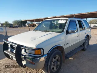 1996 Isuzu Rodeo z VIN 4S2CM58V9T4331093, wystawiony jako IAAI lot #41062073 z przebiegiem 161 833 mil mil oraz . Historia ofert i sprzedaży dostępna na DreamBid. Obrazek 2.