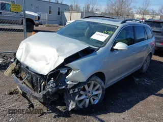 2011 Volkswagen Jetta SportWagen TDI with VIN 3VWPL7AJ0BM672093, listed as a IAAI auction lot 41849075 with 205,684 mi miles. Bid and sale history available at carsss.com. Image 2.