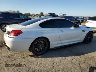 2015 BMW M6 z VIN WBSLX9C51FD160757, wystawiony jako Copart lot #51991315 z przebiegiem 71 133 mil mil oraz Szkody całkowita. Historia ofert i sprzedaży dostępna na DreamBid. Obrazek 3.