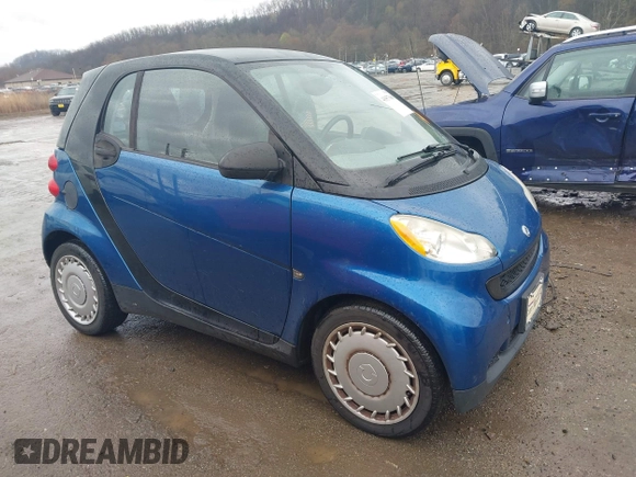 2009 Smart fortwo Pure with VIN WMEEJ31X69K312553, listed as a IAAI auction lot 41957660 with 156,476 mi miles. Bid and sale history available at carsss.com. Image 1.