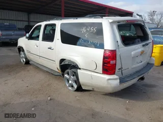 2012 Chevrolet Suburban LTZ with VIN 1GNSKKE71CR251475, listed as a IAAI auction lot 41276204 with 241,316 mi miles. Bid and sale history available at carsss.com. Image 3.