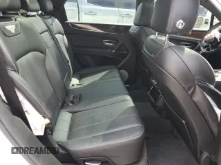 2020 Bentley Bentayga V8 z VIN SJAAM2ZV2LC028213, wystawiony jako Copart lot #52550255 z przebiegiem 50 238 mil mil oraz Szkody całkowita. Historia ofert i sprzedaży dostępna na DreamBid. Obrazek 11.