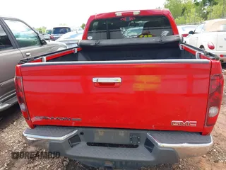 2010 GMC Canyon SLE1 z VIN 1GTDSCDE0A8137817, wystawiony jako IAAI lot #42178917 z przebiegiem 208 192 mil mil oraz . Historia ofert i sprzedaży dostępna na DreamBid. Obrazek 16.