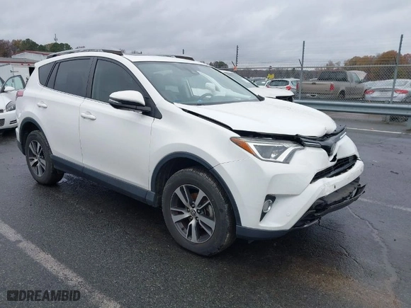 2017 Toyota RAV4 XLE with VIN JTMRFREV6HJ716907, listed as a IAAI auction lot 41056444 with 118,335 mi miles. Bid and sale history available at carsss.com. Image 1.