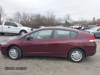 2011 Honda Insight LX z VIN JHMZE2H52BS004304, wystawiony jako IAAI lot #41827541 z przebiegiem 141 072 mil mil oraz . Historia ofert i sprzedaży dostępna na DreamBid. Obrazek 14.