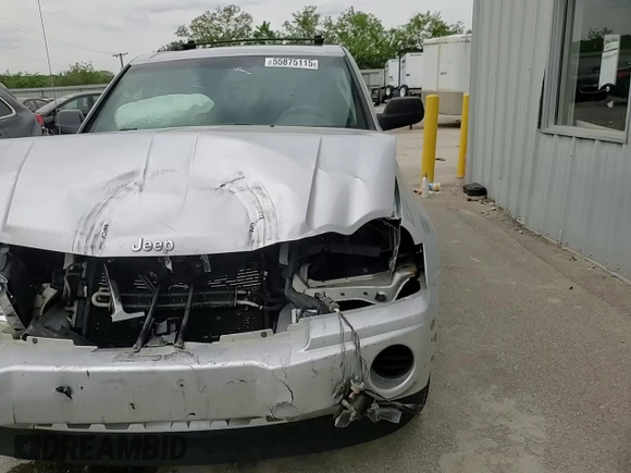 2007 Jeep Grand Cherokee Laredo z VIN 1J8GR48K37C617623, wystawiony jako Copart lot #55875115 z przebiegiem 117 588 mil mil oraz Szkoda całkowita • Salvage title. Historia ofert i sprzedaży dostępna na DreamBid. Obrazek 13.