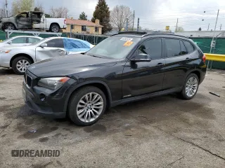 2014 BMW X1 xDrive28i z VIN WBAVL1C59EVY15024, wystawiony jako Copart lot #54265555 z przebiegiem 148 295 mil mil oraz Nie do naprawy • Non repairable. Historia ofert i sprzedaży dostępna na DreamBid. Obrazek 1.