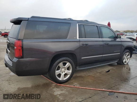 2016 Chevrolet Suburban LT with VIN 1GNSCHKC1GR103107, listed as a Copart auction lot 82763174 with 71,265 mi miles and Clean Title. Bid and sale history available at carsss.com. Image 3.