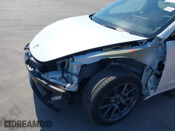 2023 Tesla Model 3 with VIN 5YJ3E1EA9PF585632, listed as a IAAI auction lot 40520993 with 7,775 mi miles and . Bid and sale history available at DreamBid. Image 6.