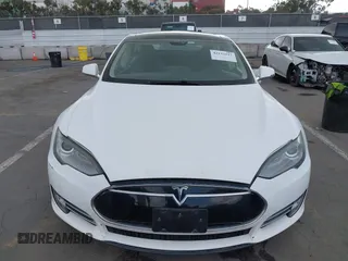 2014 Tesla Model S 60 with VIN 5YJSA1H14EFP34738, listed as a IAAI auction lot 42132117 with 120,898 mi miles and . Bid and sale history available at DreamBid. Image 12.