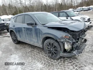 2024 Mazda CX-5 2.5 S Carbon Edition with VIN JM3KFBCM2R0359145, listed as a Copart auction lot 46278415 with 55,390 mi miles and Salvage Title. Bid and sale history available at carsss.com. Image 4.
