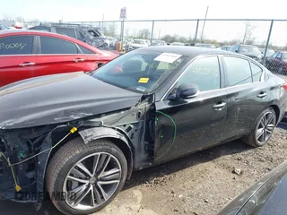 2015 Infiniti Q50 Premium with VIN JN1BV7AR1FM417499, listed as a IAAI auction lot 42063460 with 117,210 mi miles. Bid and sale history available at carsss.com. Image 15.
