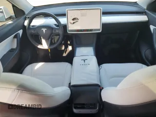 2022 Tesla Model Y Long Range with VIN 7SAYGDEE1NF339663, listed as a Copart auction lot 49771965 with 33,734 mi miles and Salvage Title. Bid and sale history available at carsss.com. Image 8.