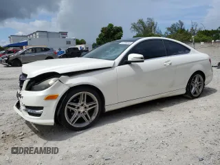 2015 Mercedes-Benz C 250 with VIN WDDGJ4HB3FG399565, listed as a Copart auction lot 62269355 with 175,317 mi miles and Salvage title. Bid and sale history available at DreamBid. Image 1.