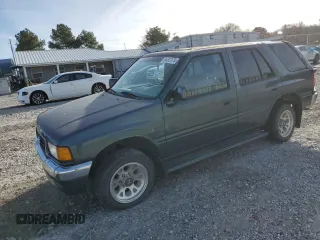 1995 Honda Passport z VIN 4S6CM58V5S4429972, wystawiony jako Copart lot #84513174 z przebiegiem 129 872 mil mil oraz Szkody całkowita. Historia ofert i sprzedaży dostępna na DreamBid. Obrazek 1.