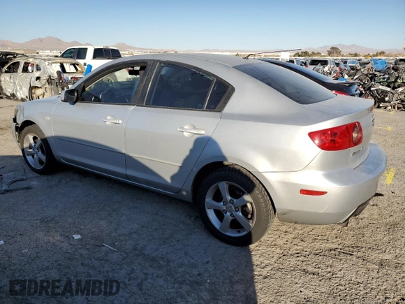 2004 Mazda 3 i with VIN JM1BK12F141168532, listed as a Copart auction lot 43964885 with 266,411 mi miles and Salvage Title. Bid and sale history available at DreamBid. Image 2.