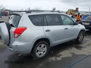 2006 Toyota RAV4 with VIN JTMZD33V965007142, listed as a IAAI auction lot 42117185 with 330,017 mi miles and . Bid and sale history available at DreamBid. Image 4.