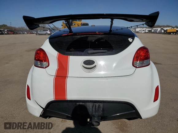2013 Hyundai Veloster w/Gray Int z VIN KMHTC6ADXDU127194, wystawiony jako Copart lot #51751345 z przebiegiem 122 221 mil mil oraz Szkoda całkowita • Salvage title. Historia ofert i sprzedaży dostępna na DreamBid. Obrazek 6.