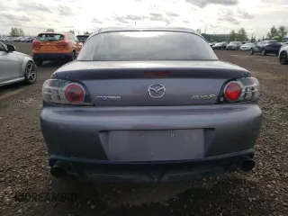 2005 Mazda RX-8 with VIN JM1FE173050145886, listed as a Copart auction lot 71110404 with 66,894 mi miles and Salvage Title. Bid and sale history available at carsss.com. Image 6.