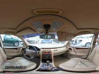 2000 Mercedes-Benz E 320 with VIN WDBJH65J8YA981779, listed as a IAAI auction lot 42107928 with 276,090 mi miles and . Bid and sale history available at DreamBid. Image 19.
