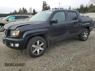 2014 Honda Ridgeline SE with VIN 5FPYK1F68EB012928, listed as a Copart auction lot 48702365 with 124,359 mi miles and Salvage Title. Bid and sale history available at carsss.com. Image 1.