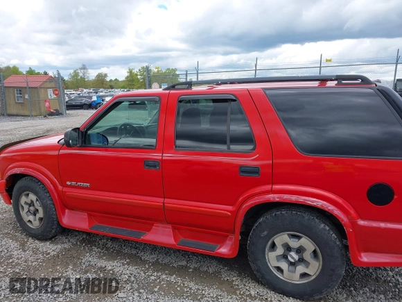 2004 Chevrolet Blazer LS z VIN 1GNDT13X64K127182, wystawiony jako IAAI lot #42188177 z przebiegiem 135 946 mil mil oraz . Historia ofert i sprzedaży dostępna na DreamBid. Obrazek 14.