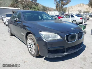 2013 BMW 7 Series 750i with VIN WBAYA8C50DD227951, listed as a IAAI auction lot 41842264 with 157,438 mi miles. Bid and sale history available at carsss.com. Image 1.